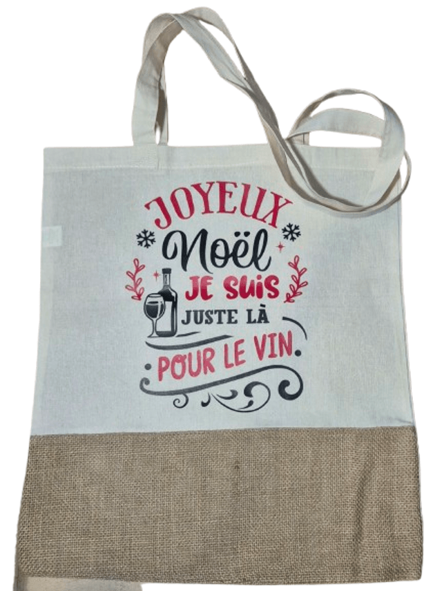 Tote bag " Joyeux Noël, je suis là juste pour le vin"